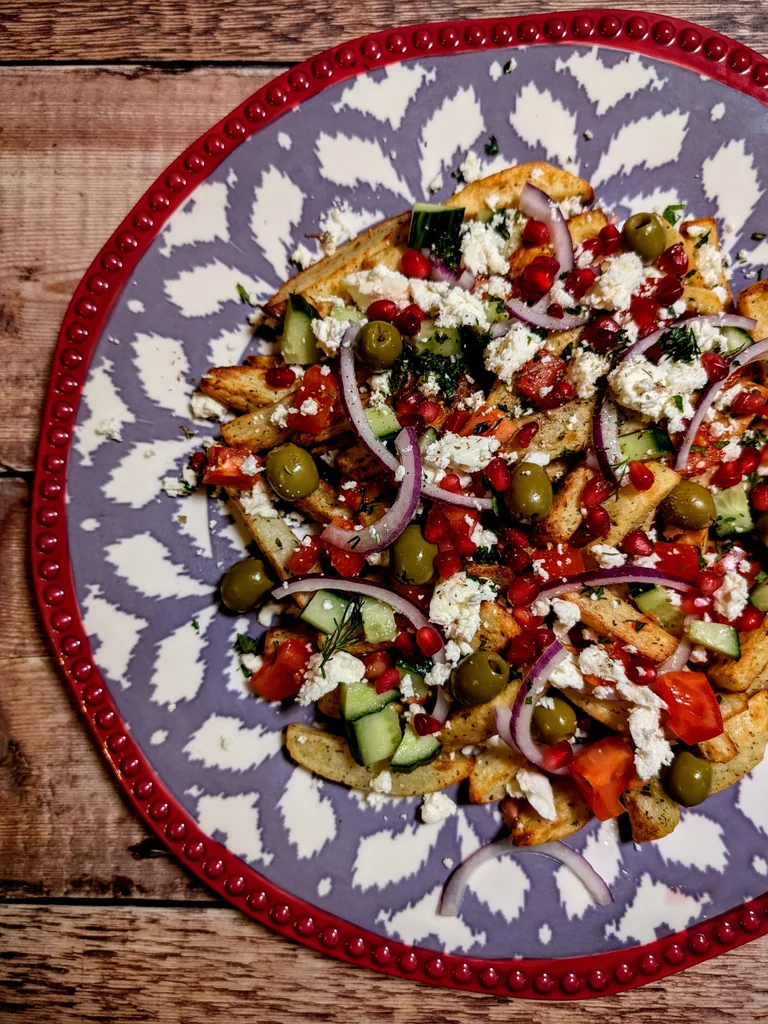 Greek Loaded Fries with Feta and Pomegranate